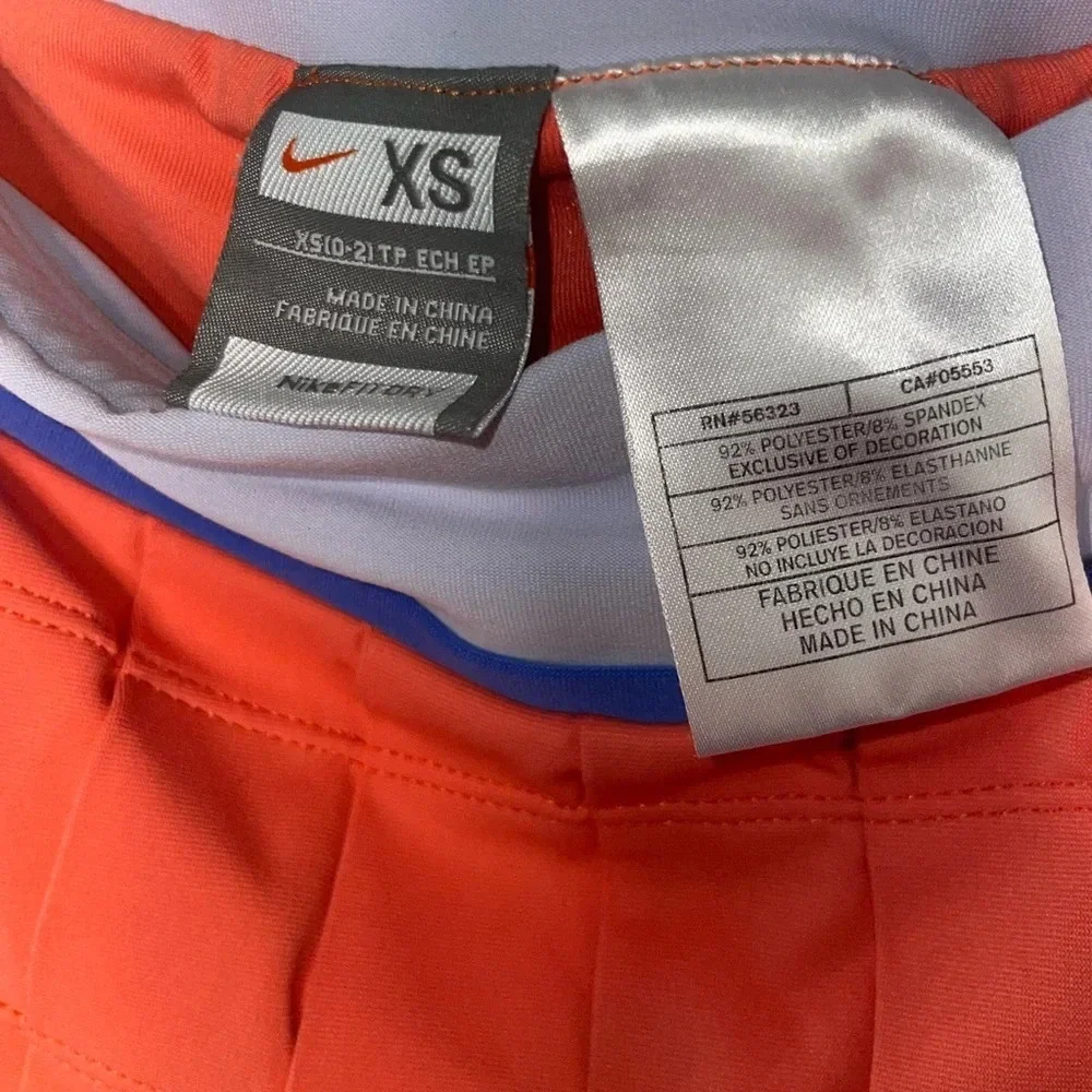 NIKE Fit Dry Pleated Tennis Skort Size XS Salmon Coral Pink Golf Athletic Spring